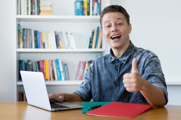 German computer science student working at computer
