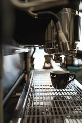 Professional coffee machine pouring espresso. Barista coffee making process.