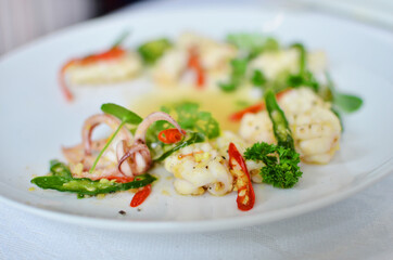 Stir fried squid with chilli and brocolli