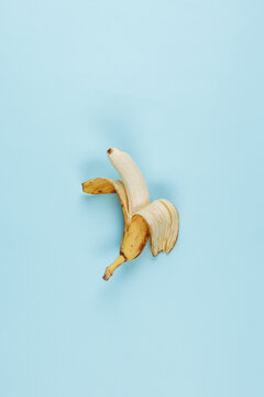 Bananas on a blue background. The view from the top. Art.