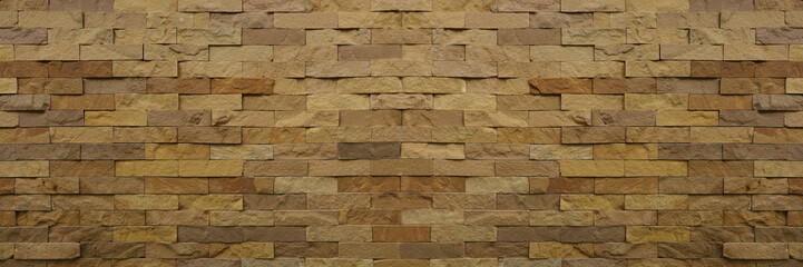 Brown aged natural sand stone walling for texture and design background