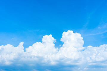 Naklejka na ściany i meble The white clouds in the rainy season which are arranged beautifully On a light blue sky 