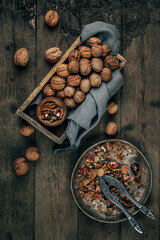Nuts on an old wooden background. The view from the top. Art.