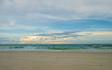 Fototapeta na wymiar Morning landscape tropical beach clouds and blue sky