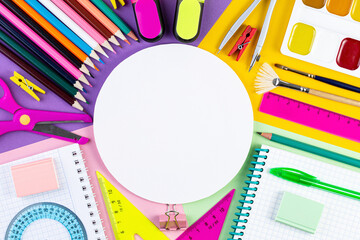 Back to school concept. various writing tools and other school stationary on colorful paper background. summer time, creativity and education concept. template for text or design