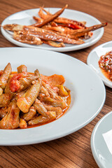 Turkish Traditional Soup with bread on white rustic wooden background, Bamya Yemeği.
