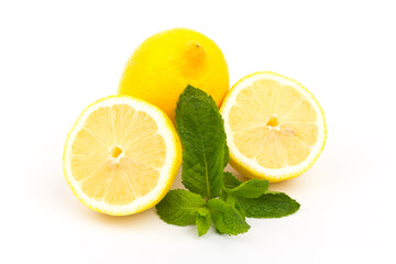 Group of lemons with mint leaves, isolated on white background