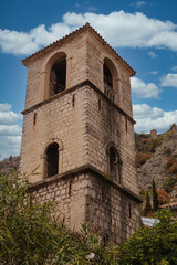 Fototapeta na wymiar An Old Stone Bell Tower Behind Kotor Montenegro