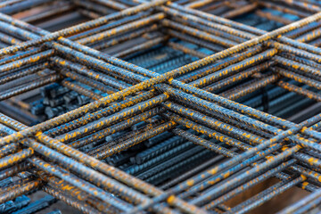 Iron reinforcing bar also known as rebar is stacked ready to be used in construction