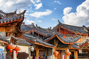 Fototapeta premium Traditional Chinese tile roofs of authentic houses, Lijiang