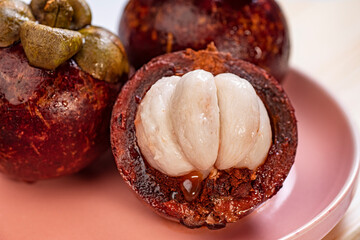 Are Cut Mangosteen On The Pink Plate