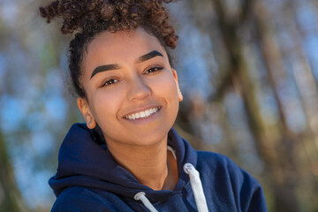 Happy Biracial Mixed Race African American Girl Teenager Smiling With Perfect Teeth