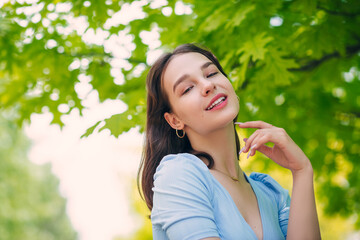 Beautiful girl is smiling. Sunny warm colors. Copyspace