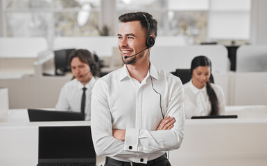 Naklejka na ściany i meble Positive operator with headset in office