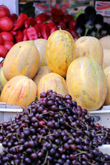 Colorful summer fruits on a farmer market. Many fruits.