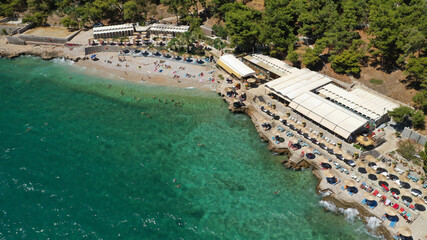 Fototapeta premium Aerial drone photo of famous beach of Arvanitia in the slopes of Acronafplia, Nafplio, Argolida, Peloponnese, Greece