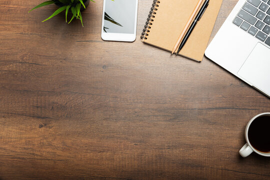 Flat lay of Office desk wooden table