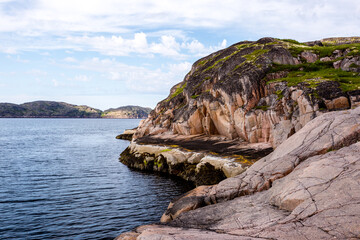 Northern polar summer. Beautiful rocky coastline of Barents sea, Arctic ocean, Russia