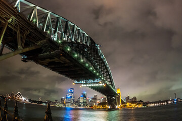 Obraz premium Bottom view of the Sydney Harbour Bridge, Sydney Harbour at night, Australia