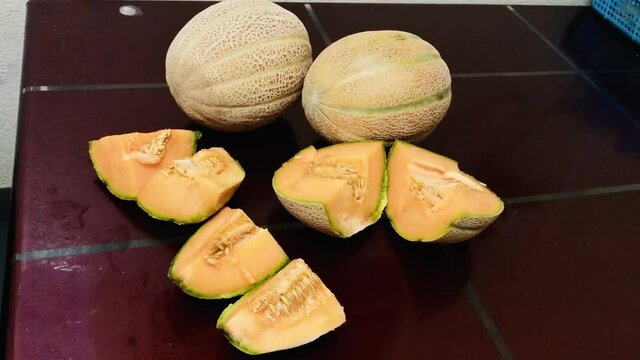 yellow muskmelon with sliced pieces