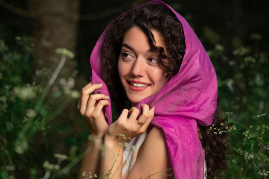 Happy Young Girl Posing With A Purple Scarf