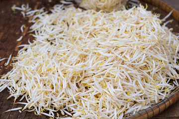 Fresh sprouts on a wooden basket