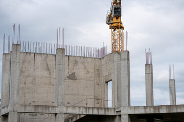 Sticking out reinforcement at the construction site of a new house.