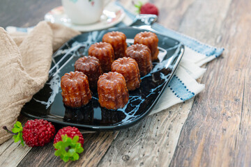Canele is a small French pastry with rum and vanilla