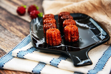 Canele is a small French pastry with rum and vanilla