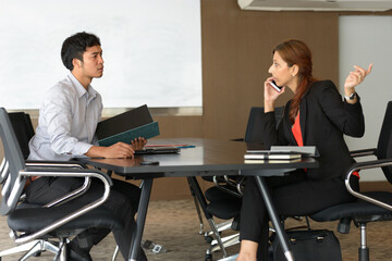 Multi ethnic business people having meeting at the office