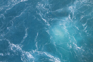 Fototapeta na wymiar Foamy Blue Sea