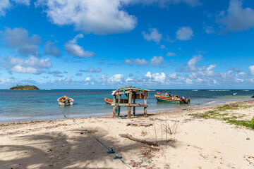 Fototapeta na wymiar Fishing boats in water in Trinite, Martinique, France