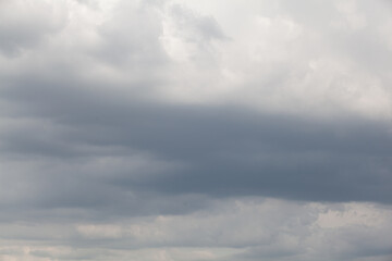Fototapeta na wymiar storm clouds closeup on the sky background