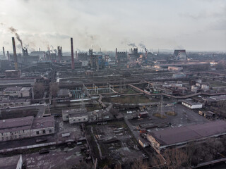 overhead top view of the air pollution by the factory