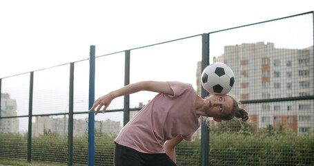 Girl practicing soccer skills and tricks