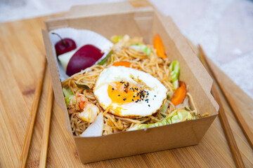 Yakisoba noddles with vegetables, seafood and egg