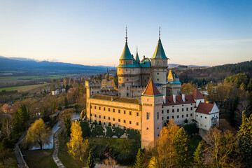 Side view of Bojnice castle with one wall bathed in lovely morning light. Medieval heritage site...