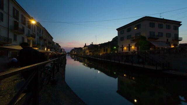 Time lapse in the evenig of the typical channel called Naviglio Grande, a nightlife area of Milan, Italy.