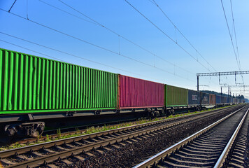 Fototapeta premium Cargo Containers Transportation On Freight Train By Railway. Intermodal Container On Train Car. Rail Freight Shipping Logistics Concept. Import - export goods from Сhina.