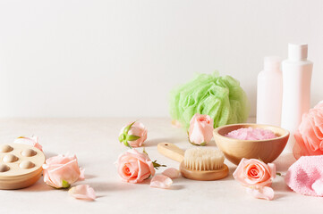 Fototapeta na wymiar skincare products and rose flowers. natural cosmetics for home spa treatment