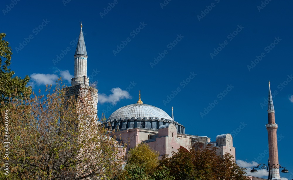 Poster domes and minarets of haggia sophia museum against a blue sky in istanbul, turkey