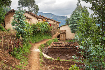 Fototapeta na wymiar Rural village on steep hills in Rwanda