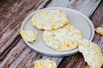 dry cookies from air rice and corn on a decorative plate