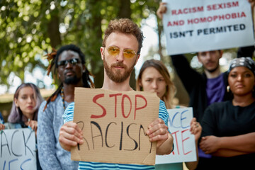 no place for hate. african american white and black BLM protestors gathered together, they want...