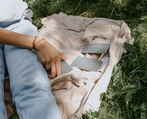 woman hand with tarot cards