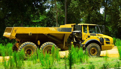 Obraz premium industrial dump truck at construction site in Conroe, TX