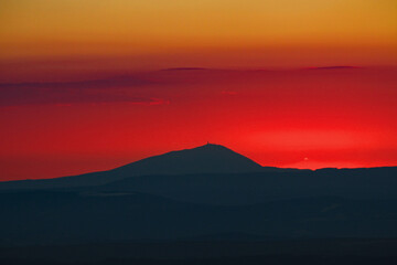 Mont Ventoux in Provence, France at summer sunset with amazing red sky.