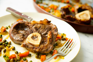 Baked ossobuco baked with vegetables