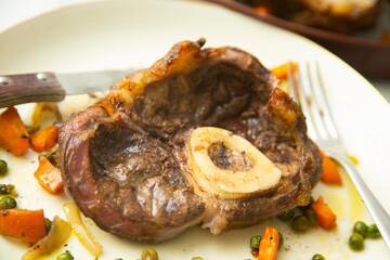 Baked ossobuco baked with vegetables