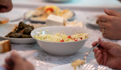 Dinner table with food during eating